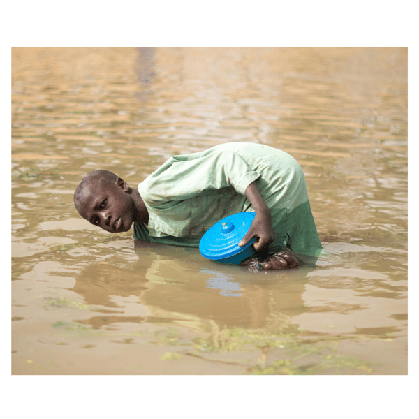 Child in muddy water
