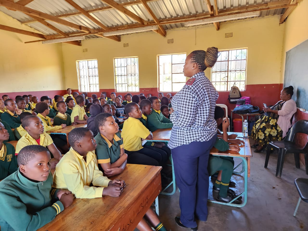 Nurse in front of a class